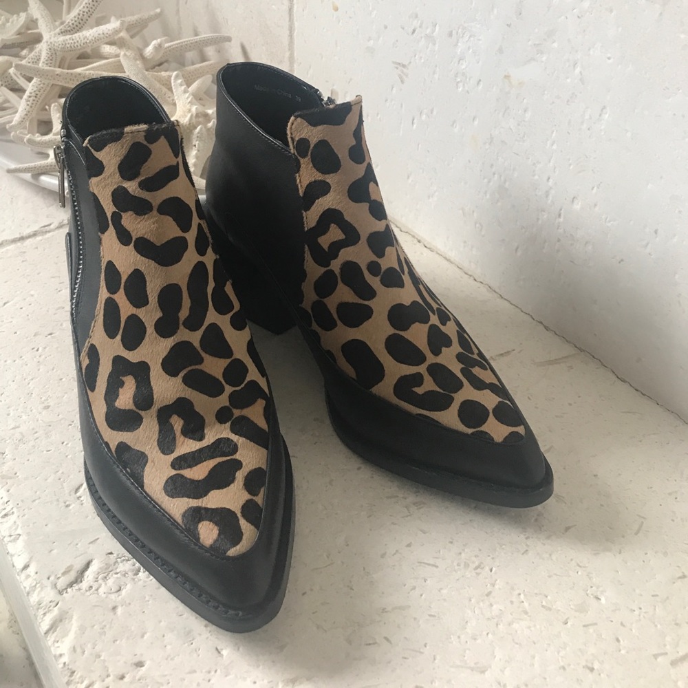 Black leather and fur boots. These are killer!